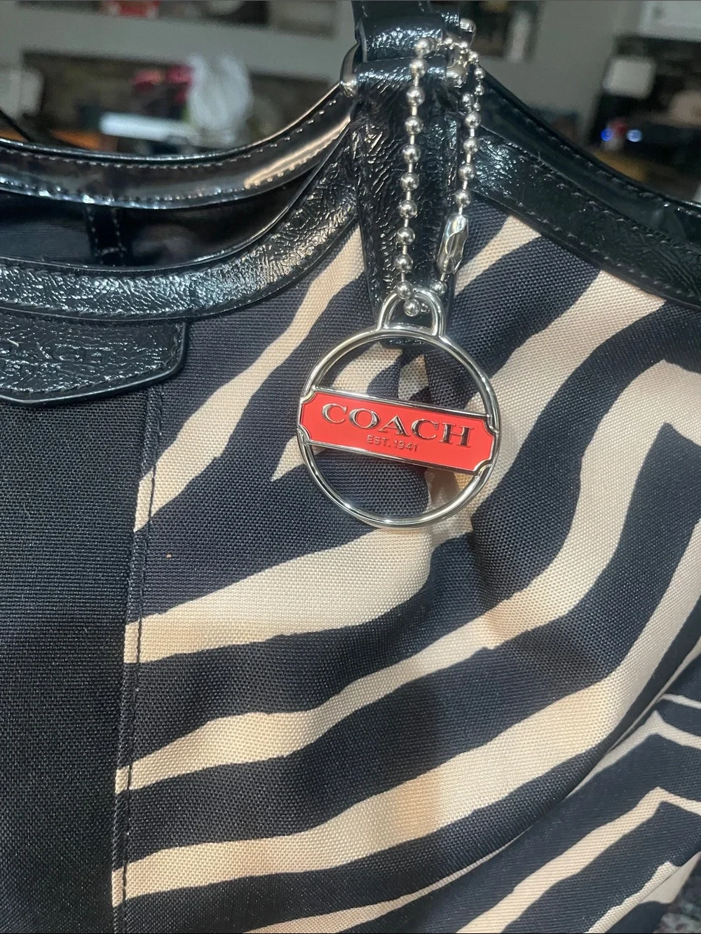 Coach Black and Cream Zebra-Print Devin Patent Leather Shoulder Tote